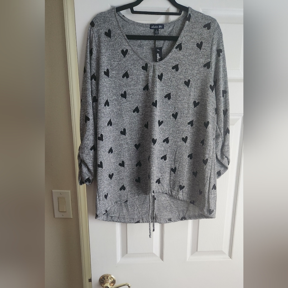 Trendy top with hearts brand new with tag